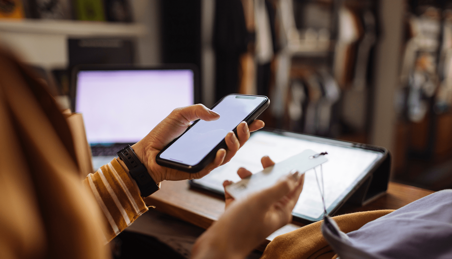 Person using smartphone in an office