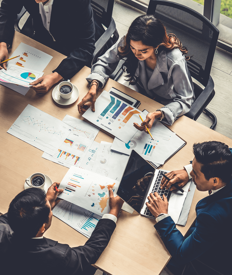 Business meeting with charts and graphs